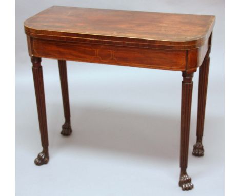 REGENCY MAHOGANY AND CROSSBANDED FOLD OUT CARD TABLE, with rounded rectangular top, boxwood line inlaid frieze, reeded legs a