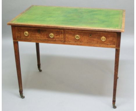 REGENCY MAHOGANY WRITING TABLE, early 19th century, green tooled leather inset top above a pair of drawers with brass hoop pu