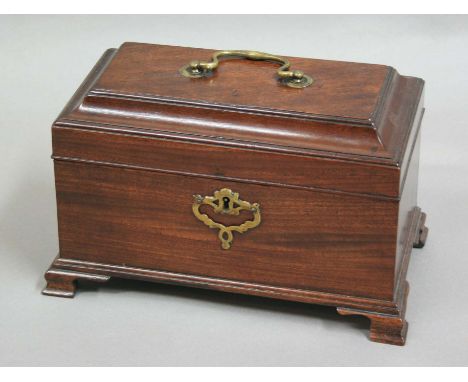 GEORGE III MAHOGANY TEA CADDY, with brass swing handle and pierced escutcheon, the fitted interior with two tin canisters and