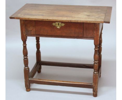 OAK SIDE TABLE, 18th century, the cleated rectangular top above a single drawer, turned legs and block stretchers, height 69c