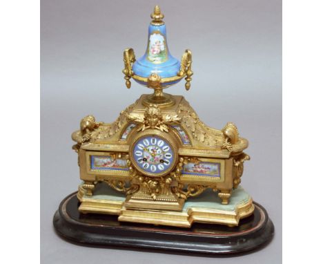 FRENCH GILT SPELTER MANTEL CLOCK the dial painted with a central floral and bird roundel,on a brass movement striking to a be