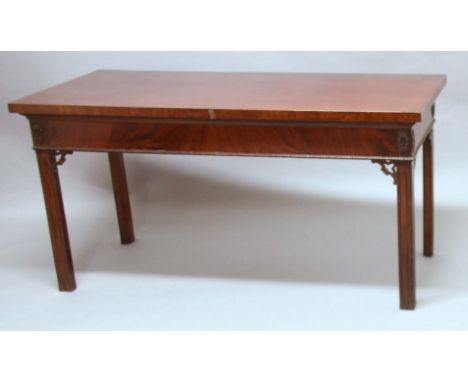 REGENCY MAHOGANY SERVING TABLE, the rectangular top above a plain frieze and moulded legs with fretwork brackets,  height 78c