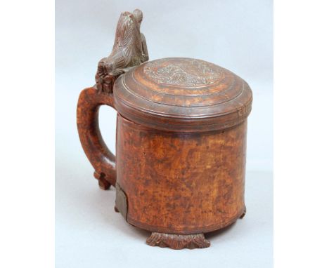 SCANDINAVIAN BURR WOOD PEG TANKARD, early 19th century, with scroll handle, carved cover and lion finial, height 24cm, width 