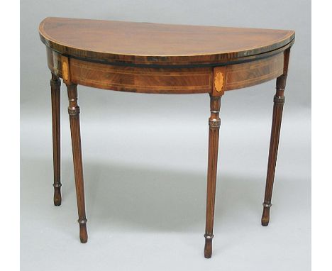 GEORGE III HEPPLEWHITE STYLE DEMI-LUNE MAHOGANY CARD TABLE, the top with rosewood crossbanding and boxwood line inlay, double