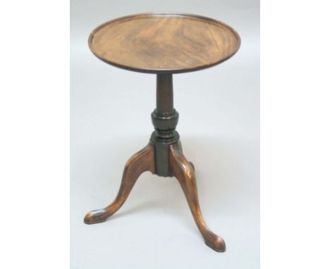 GEORGE III STYLE MAHOGANY OCCASIONAL TABLE, circa 1800, the circular tray top on a turned column and down swept tripod base, 