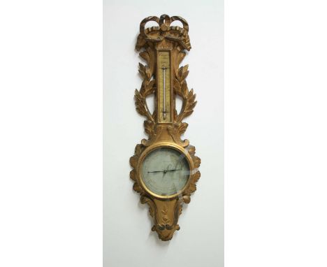 FRENCH GILT GESSO BAROMETER, early 19th century, the thermometer with painted wooden scale above a replacement card barometer