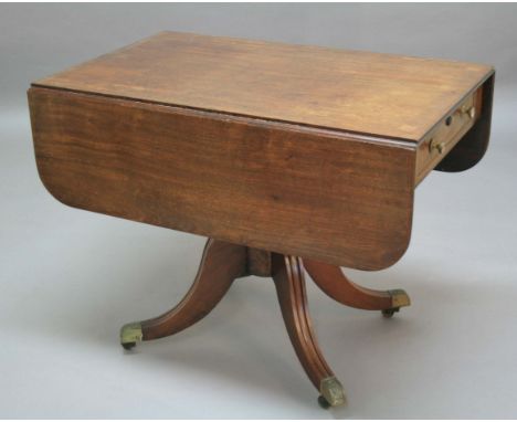 REGENCY MAHOGANY BREAKFAST TABLE, mid 19th century, the rounded rectangular top with two drop leaves above a single drawer, b