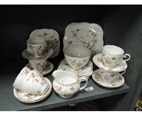 An early 20th century Royal Grafton Birds on Branches pattern tea service