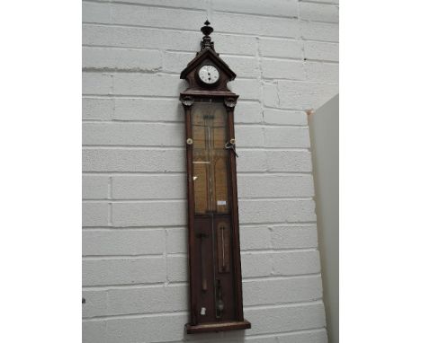 A Victorian Admiral Fitzroy barometer weather station with fitted clock having oak case with Gothic design
