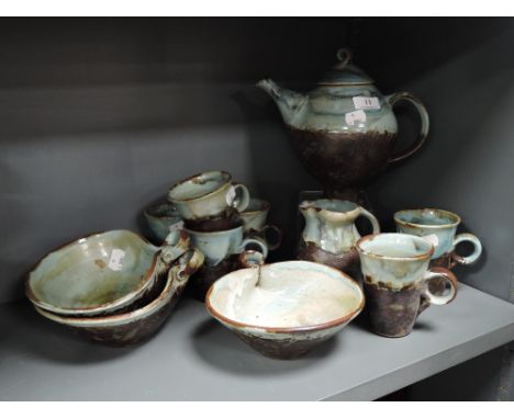 A modern Roger Cockram studio pottery part tea service with additional bowls.