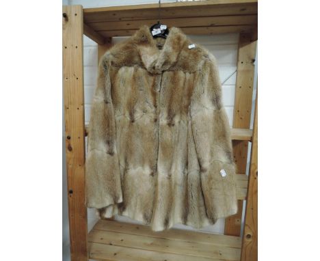A vintage Hutcheson fur coat in medium length