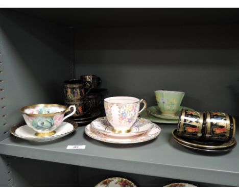 A selection of tea cup and saucers sets including Tuscan, Royal Albert and Roslyn