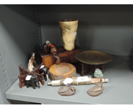 A mixed lot of vintage items to include treen elephants, ash tray and music box also figurines, horn beaker and antler handle
