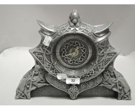 A modern Seamus Moran mantel clock having Celtic design in pewter