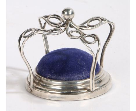 Edward VII silver hatpin stand, Birmingham 1904, maker W.A, of crown form with blue velvet upholstered cushion, 8.5cm diamete