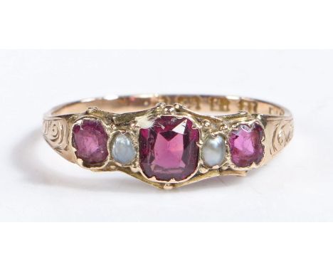 Victorian 12 carat gold ruby and pearl ring the head set with three emerald cut rubies set with intersected pearl stones, rin