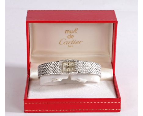 Jaeger LeCoultre 18 carat white gold and diamond ladies wristwatch, the signed silver dial with baton markers, the bezel set 