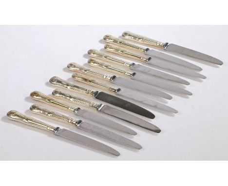 Twelve Elizabeth II silver handled dessert knives,&nbsp;Sheffield 1960 and 1983, maker Walker &amp; Hall, with kings pattern 