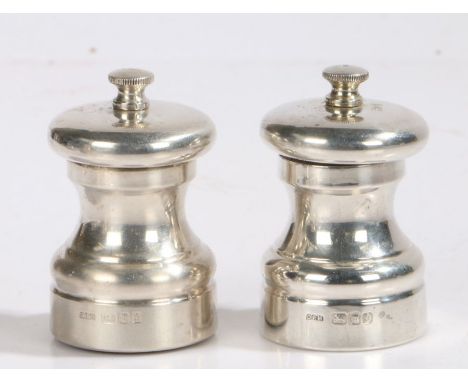 Pair of Elizabeth II silver pepper grinders, London 1990, maker David R. Mills, 7cm high