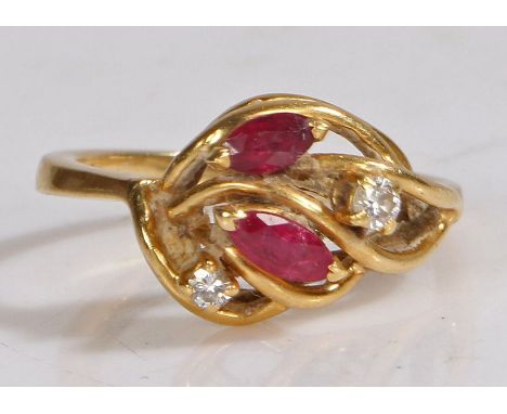 18 carat gold diamond and ruby ring, the head set with two claw mounted round cut diamonds and two oval rubies, stamped 750, 