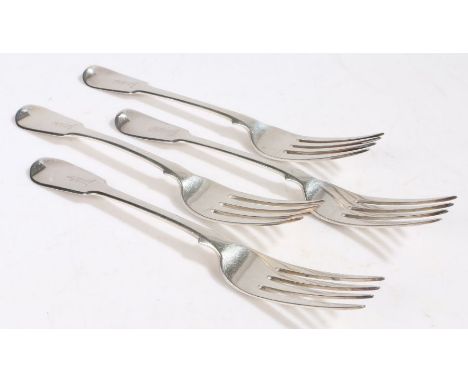 Four George III silver table forks, London 1808, maker Edward Lees, the fiddle pattern handles engraved with a crest depictin