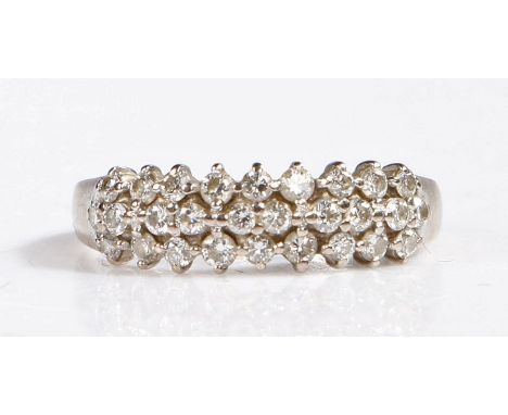 18 carat white gold and diamond ring, the head set with three rows of round cut diamonds, band stamped 750, ring size R weigh