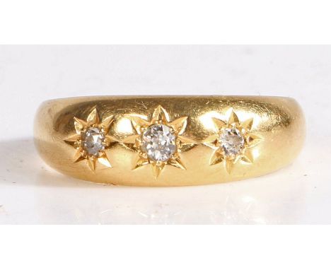 18 carat gold and diamond gypsy ring, the head set with three diamonds, the largest approx 0.09 carat, ring size R weight 3.3