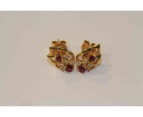 Pair of 18 carat gold, ruby and diamond earrings