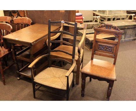 Lees style drop leaf trolley, ladder back rush seated elbow chair, Victorian oak scroll arm elbow chair and carved oak hall c
