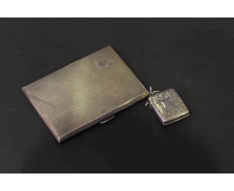 Engraved silver vesta case and engine turned cigarette case (2)
