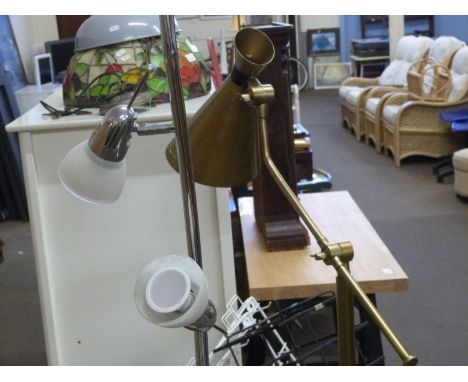 A faux brass effect angle poise standard lamp together with a three light chrome and frosted glass standard lamp