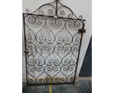 A cast iron gate with scroll pattern, 105cm wide 
