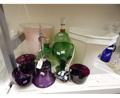 A large French pink glass lamp of flared form, a green glass table lamp (possibly Grey-Stan), amethyst glass finger bowls and