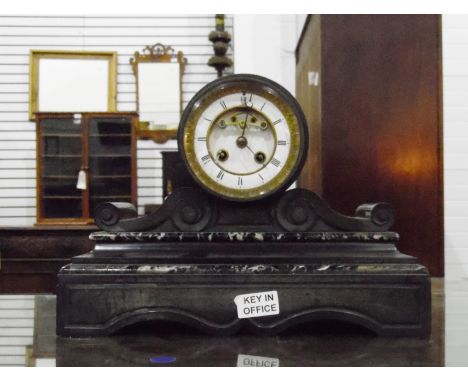 Victorian Black slate mantel clock with drum-shaped case and brocot escapement 