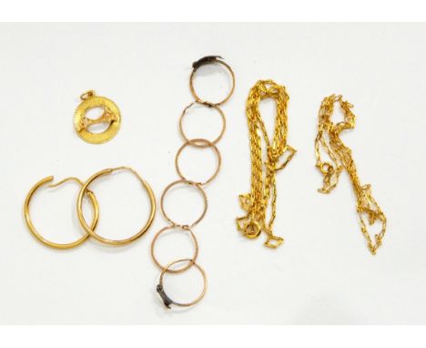 A pair of 14ct gold hoop earrings, a Golden Gate charm marked 14K (6.4g approx), two chains and a puzzle ring 