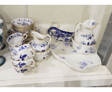 A Copeland Spode china 'Blue Bowpot' pattern teaset comprising teacups and saucers, side plates, cake plates, two bowls, two 