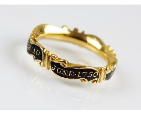 A mid 18th century gold and enamel mourning ring, the black enamelled scrolling band with gold inscription 'Frans Humbarston 