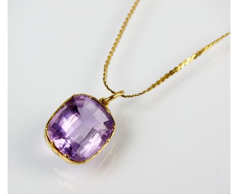 An amethyst pendant, the faceted cushion cut amethyst collet and claw set in yellow metal mount, suspended by 18ct yellow gol