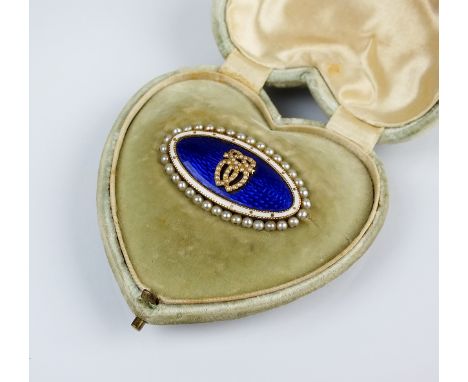 A 19th century seed pearl and blue guilloche enamel mourning brooch, the oval blue enamel brooch with central split seed pear