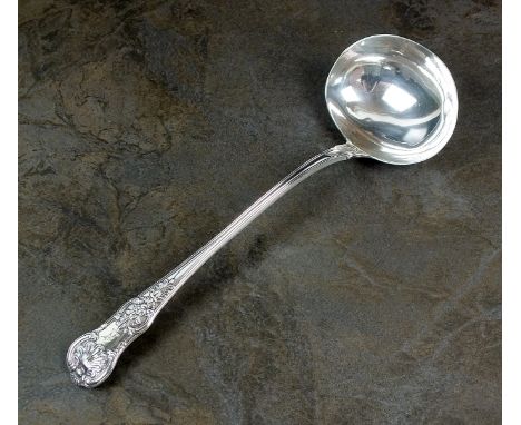 A George IV silver Queens pattern soup ladle, William Chawner II, London 1822, with engraved crest to terminal, 32cm long, we