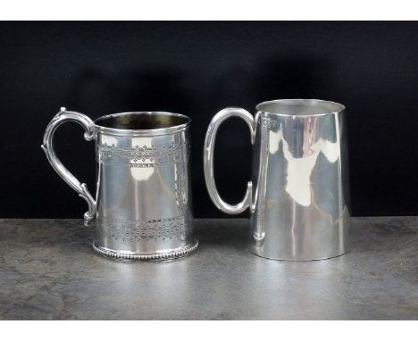 A Victorian silver christening mug R*, London 1871, of circular form with bright cut engraved decoration and vacant cartouche