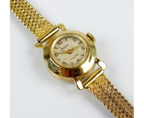A lady's yellow metal Stowa bracelet watch, the silvered dial with Arabic numerals, manual wind, with attached yellow metal b