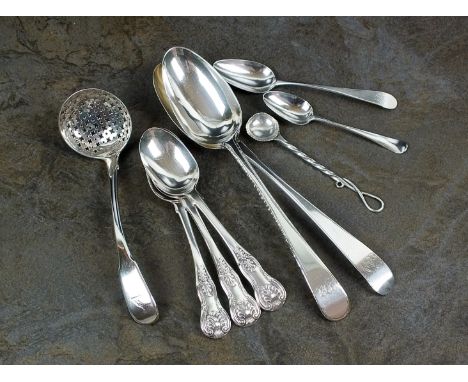 A late 18th century Old English pattern silver tablespoon, Hester Bateman, London, date mark rubbed, together with a further 