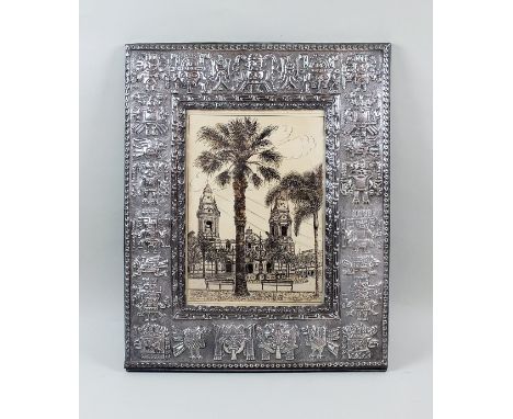 A South American white metal mounted photograph frame, of rectangular form with embossed stylised Mayan motifs, easel back su