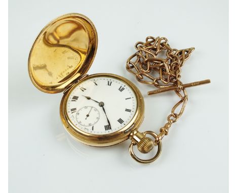 A gentleman's gold plated swiss made full hunter pocket watch, the steel keyless movement stamped 'Swiss made', the white ena