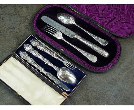 A Victorian cased silver Christening set, Walter & John Barnard, London 1887, comprising; knife, fork and spoon, together wit