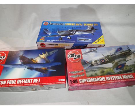 Three Airfix kits; Spitfire MK VC/Seafire III C, Boulton Paul Defiant N.F.1 and Spitfire MK XII. UK P&amp;P Group 1 (£16+VAT 