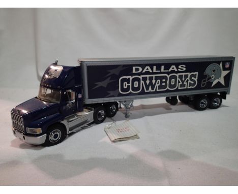Franklin Mint 1/43 scale Mack tractor unit with box trailer, Dallas Cowboys in excellent condition, ex display model, dusty i