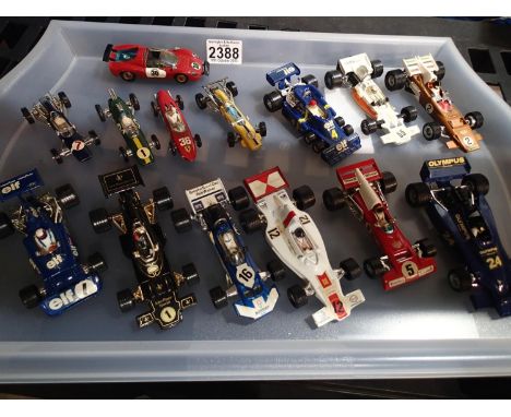 Fourteen Corgi/Dinky racing cars, early and later issues, mostly in very good to excellent condition, unboxed. UK P&amp;P Gro