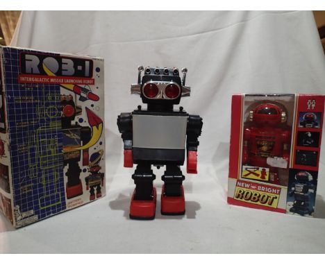 Rob-1 battery operated robot, H: 30 cm, with flashing eyes, light up screen, walking and moving arms, working, missing rocket